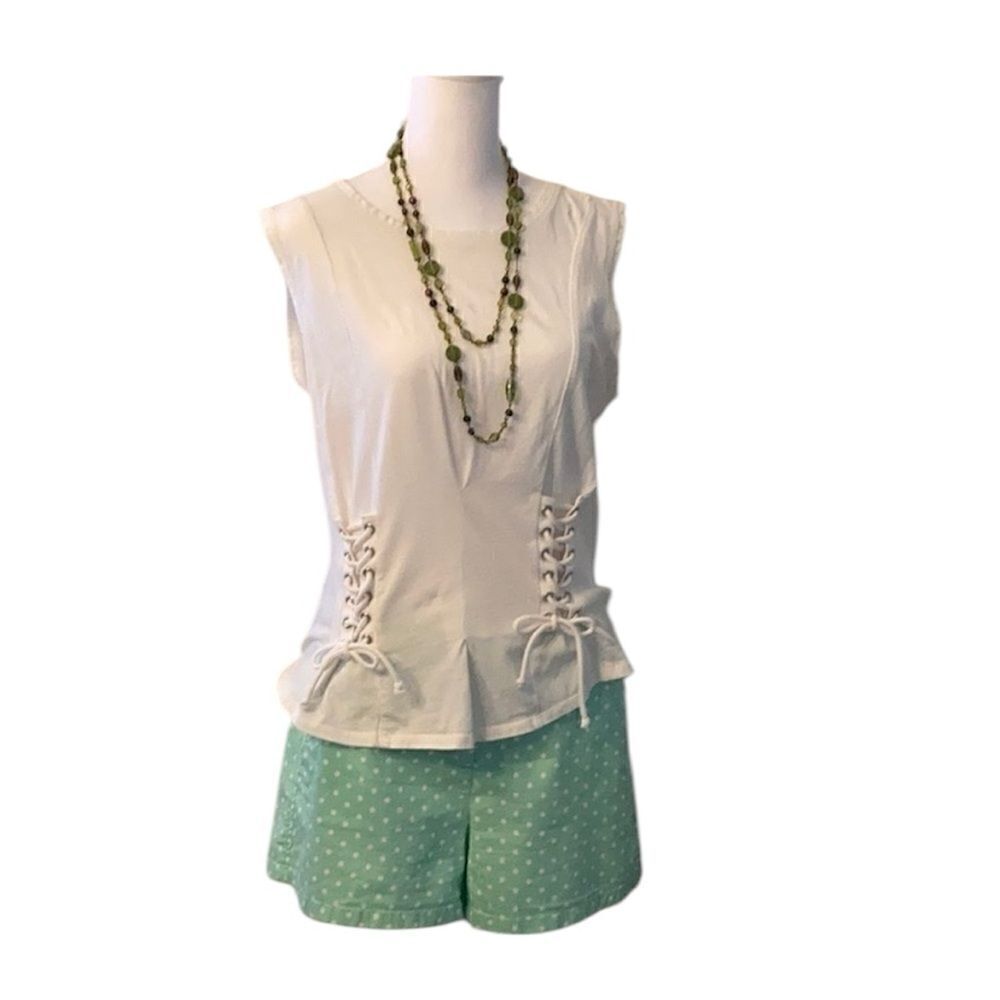 William Rast size medium white sleeveless lace up detail top one tiny spot EUC